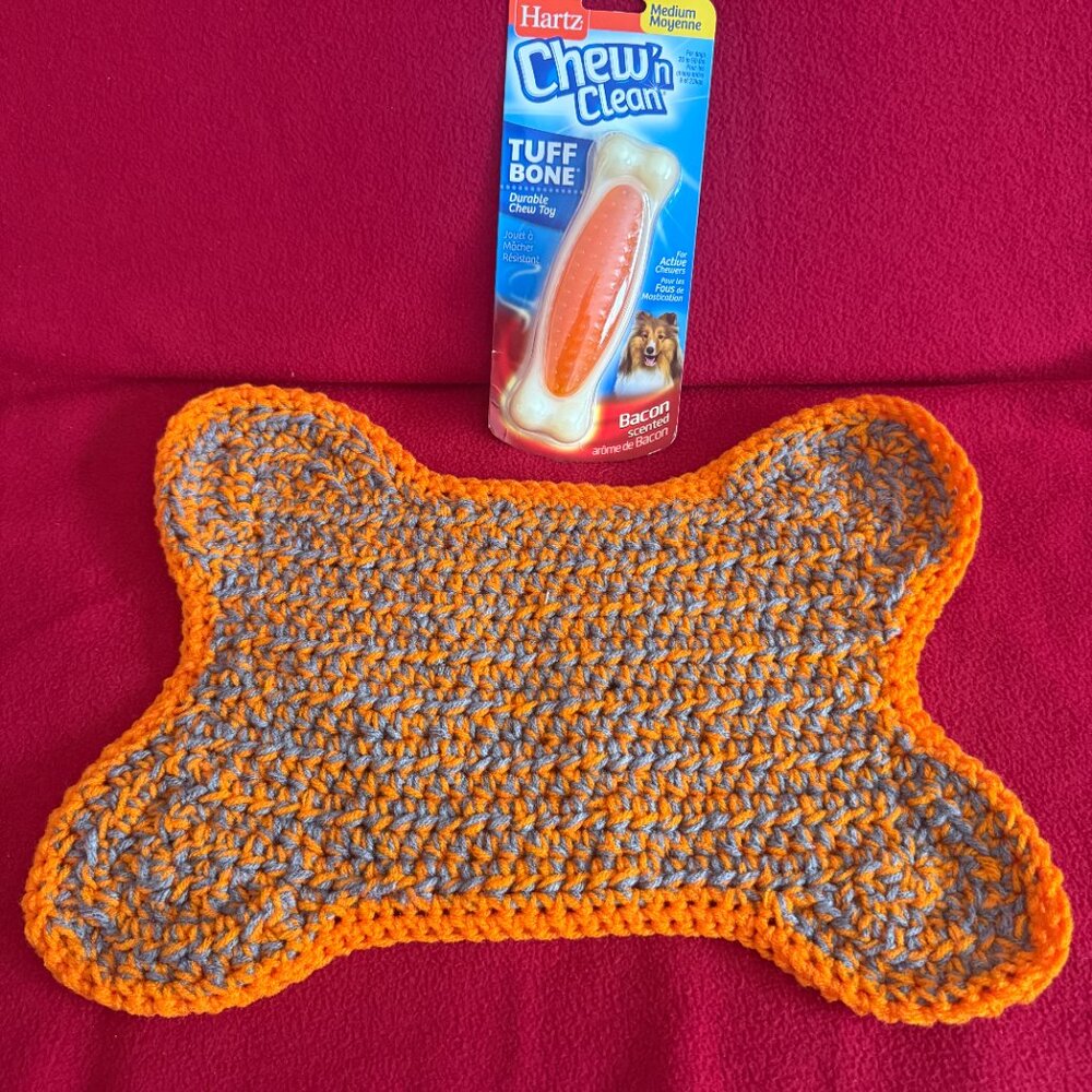 Handmade dog dish placemat (bone shaped) and bacon scented Hartz chew toy